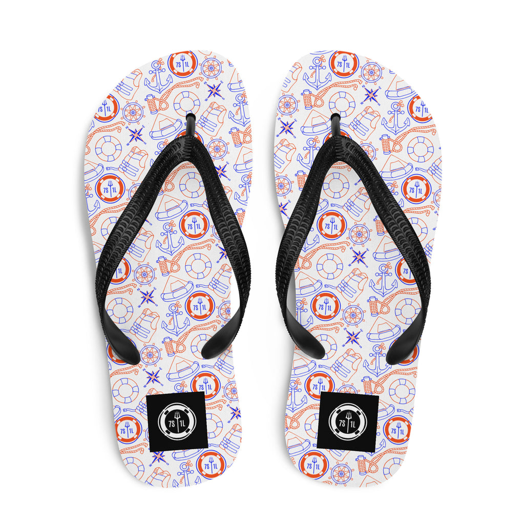 Pair of flip-flops with nautical pattern on a white background