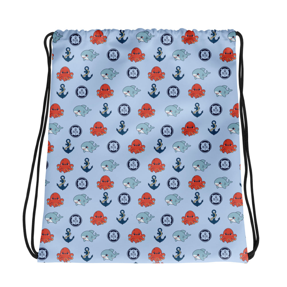 bag with nautical pattern featuring octopuses, anchors, and baby sharks on a light blue background. Main image
