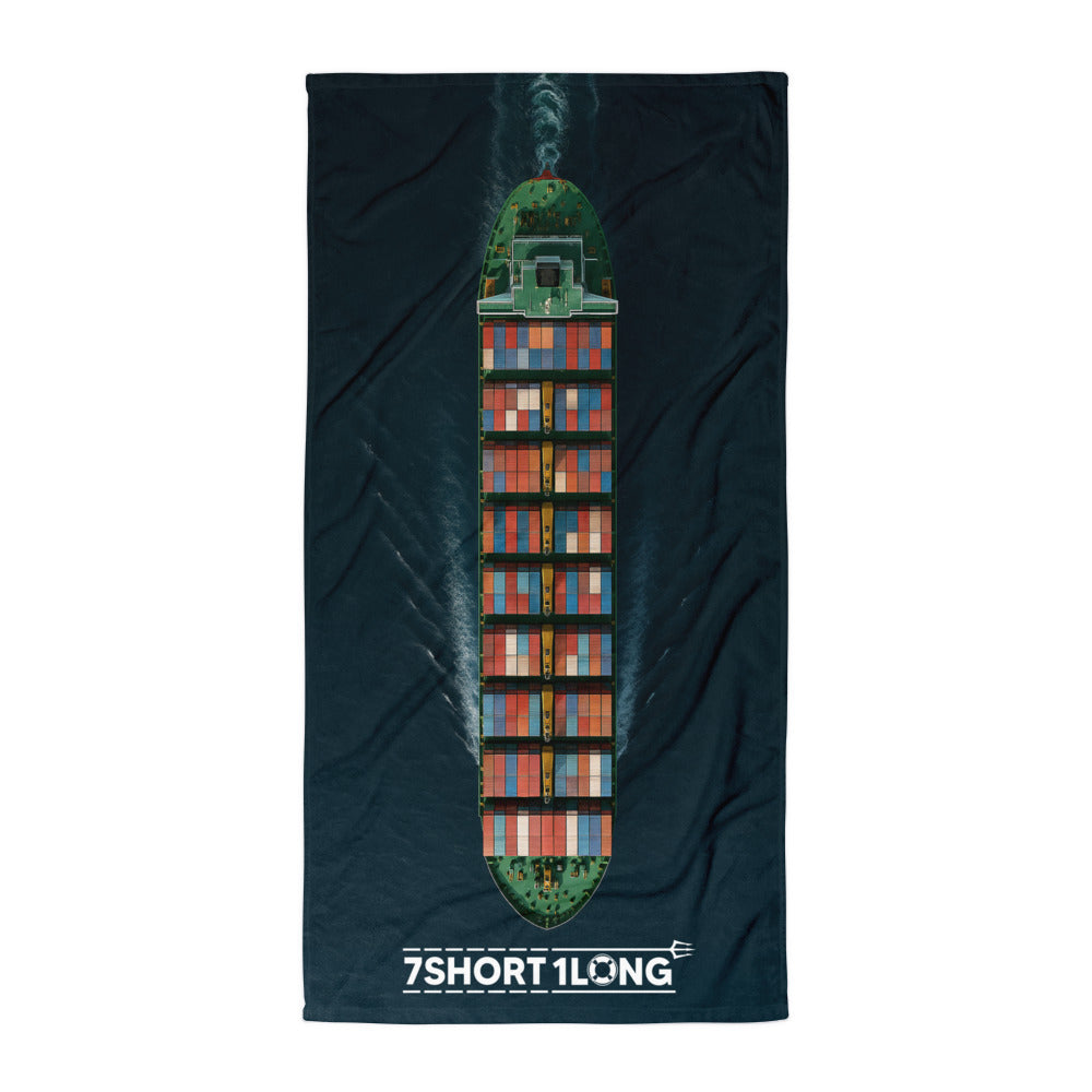 Towel with a colorful cargo ship on a ocean background