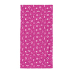 Pink towel with white icons of the sea on a white background