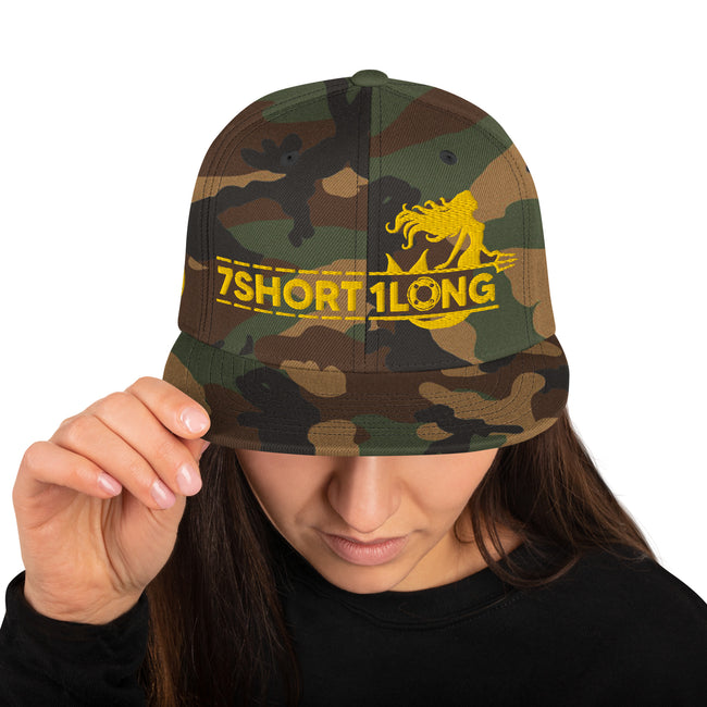 Snapback cap camouflage with 7-Shot-One-Long logo in gold and mermaid design, inspired by maritime folklore and seafaring culture. Hover Image